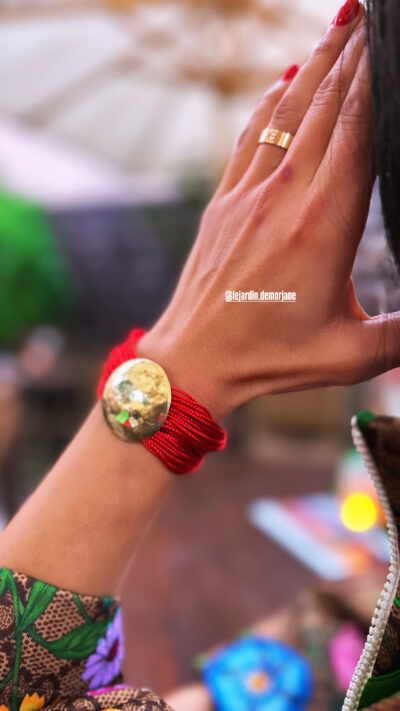 Bracelet pièce rouge